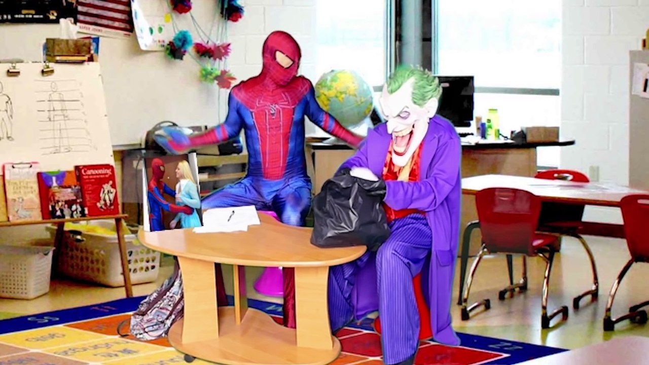 Spiderman VS Joker - a Day at School !!!  Wonderwoman sitting at a desk near the Spiderman WOW !!!