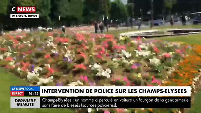 Champs-Elysées: Un véhicule percute une camionnette de gendarmerie et prend feu - La police sur place