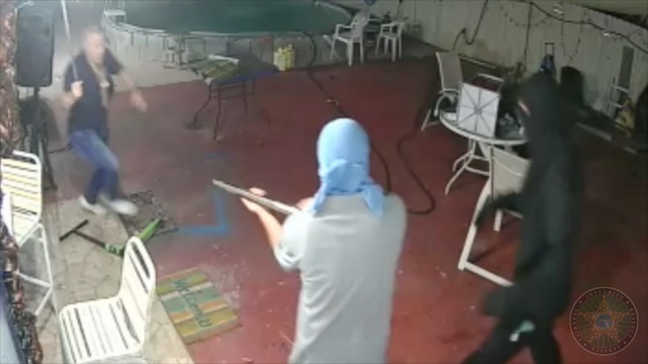 Florida homeowner armed with a machete chases gun toting burglars out