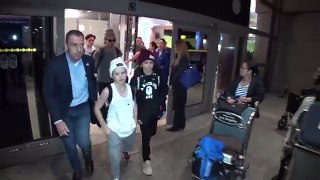 216.David Beckham Holding Hands With Harper As The Family Lands At LAX