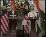 Narendra Modi in new Look with PM of Malesia in a Joint press