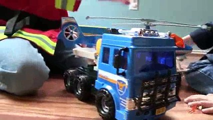 03.Toy Truck Videos for Children - Toy Bruder Mack Fire Engine and Toy Police Truck and Helicopter_clip2