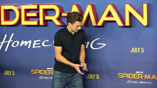 Tom Holland posing for 'Spiderman: Homecoming' photocall