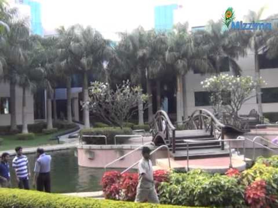 Aung San Suu Kyi plants at Infosys campus.
