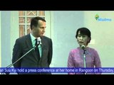 Poland's FM Radoslaw Sikorski and Daw Aung San Suu Kyi hold a press conference