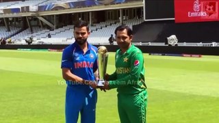 Sarfraz Ahmed and Virat Kohli with the Champions Trophy -