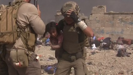 Soldier Rescues Little Girl During ISIS Attack