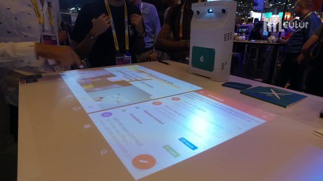Adok , un projecteur de tablette tactile pour surfaces planes