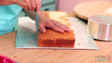 How To Make A GIANT Chocolate Eclair out of CAKE | Yolanda Gampp | How To Cake It