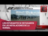 Reportan enfrentamiento entre policías y normalistas en Michoacán