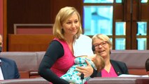 Australian senator breastfeeds baby whilst moving a motion for first time