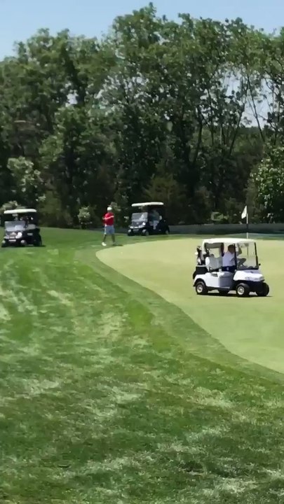 Trump Drives Golf Cart at Bedminster Club, Fist Bumps Other Golfers