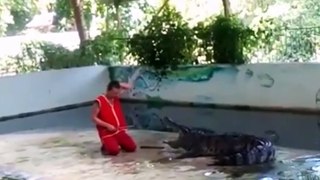 Crocodile Tries To Bite Man's Head Off