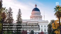 California expands travel ban to eight states