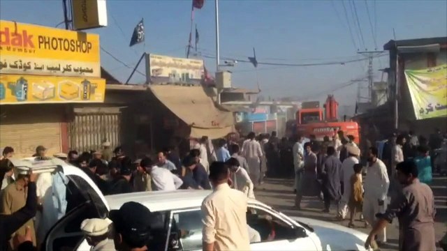 Twin blasts in NW Pakistan leave 13 dead, scores wounded