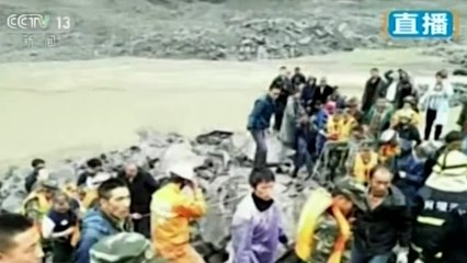 Landslide in China buries hundreds