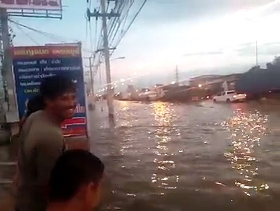 Man Rides Jet Ski On Flooded Road