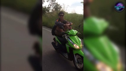 Teenager Riding Moped With His Feet