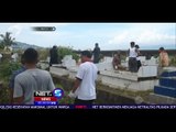 Paslon Wali Kota dan Wakil Wali Kota Ambon Pilih Bersihkan Makam Para Syuhada Waihaong - NET5