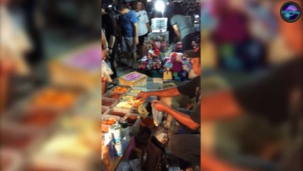 Golden Retriever Helping Out On A Market Stall