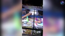 Baby Sleeping On Street Food Stall Chopping Counter