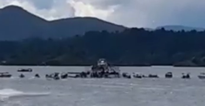 Rescuers Rush to Aid Passengers of Capsized Boat in Guatape