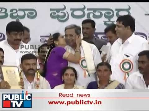 Woman Kisses CM Siddaramaiah On Stage In Palace Ground, Bengaluru