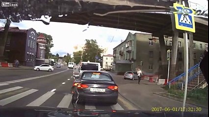 Woman on crosswalk hit by car while on phone