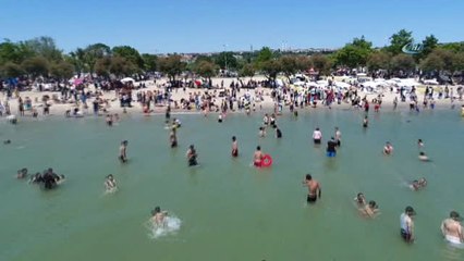 Télécharger la video: Dolup Taşan Menekşe Plajı Havadan Görüntülendi