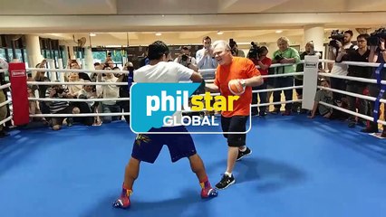 Manny Pacquiao doing mittwork with Freddie Roach