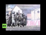 ‘Fighting for factory’: Bolivian workers clash with police over job cuts