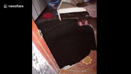 Woman missing after sinkhole opens under house in China