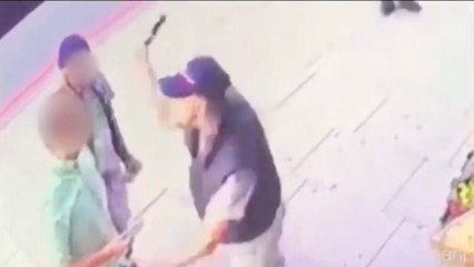 Shocking CCTV footage shows assault with bottle on London street