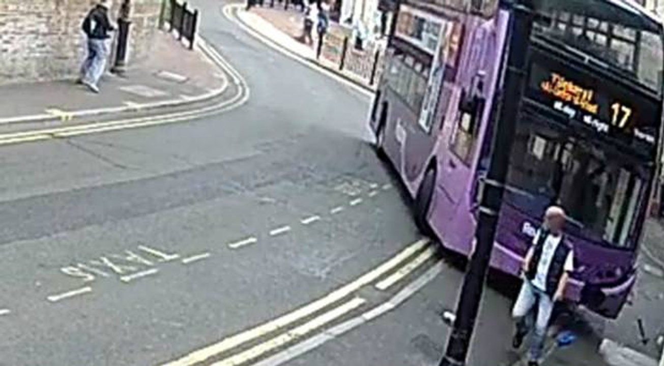 CCTV footage shows man hit by runaway bus