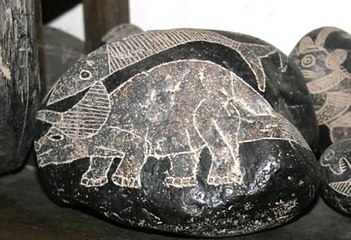 Inca alien artifacts with Dinosaurs found in Peru in the 20th century