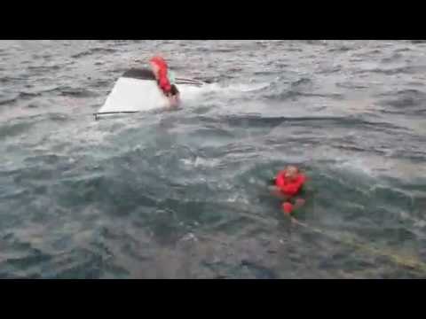US Coast Guard Rescue 5 People From Overturned Boat