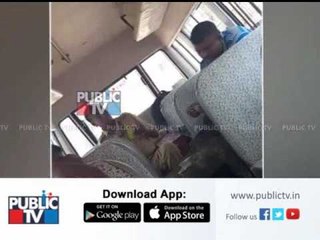 Police officers seen playing cards inside pocile vehicle infront of SP Office in Mandya