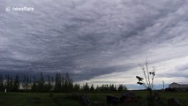 Timelapse shows wave-like pattern created by rolling clouds