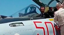 شاهد.. الأسد على متن مقاتلة روسية في قاعدة حميميم الجوية