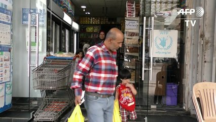 اللاجئون السوريون ينعشون عمل تجار لبنانيين صغار