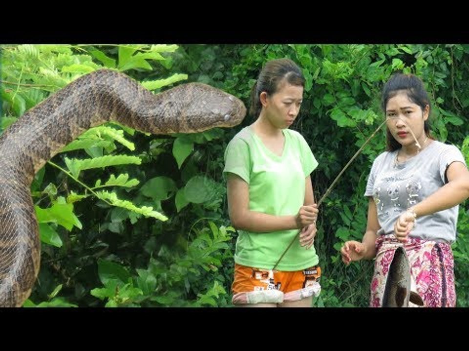Two beautiful girls see Big Snake while she Makes Hook Fishing