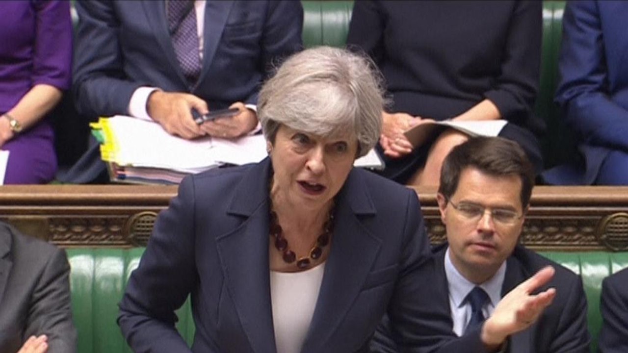 Brexit PM May evokes 'implementation period'