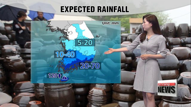 Monsoon rain on Jeju, partly sunny and warm elsewhere