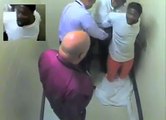 Officers repeatedly punching a handcuffed man in police custody.