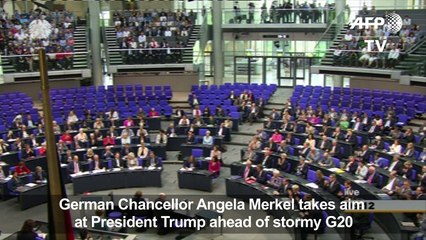 Merkel takes aim at Trump ahead of stormy G20