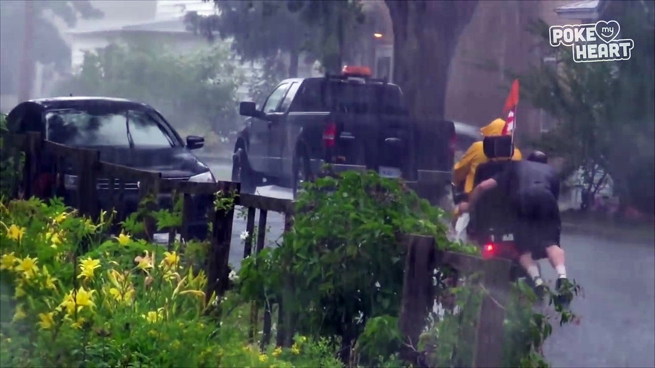 Kind Man Helps Push Another Man's Wheelchair Up A Hill in the Rain Video 2016 - Daily Heart Beat
