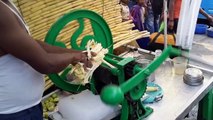 Sugar cane juice pressing Indian style, summer days that get a glass of sugar cane to the thing is really