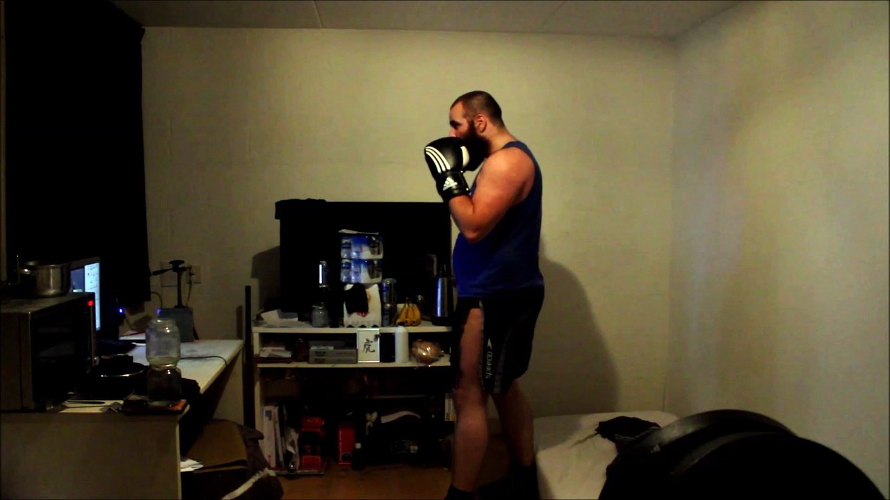 Shadow boxing with 18 oz boxing gloves 4