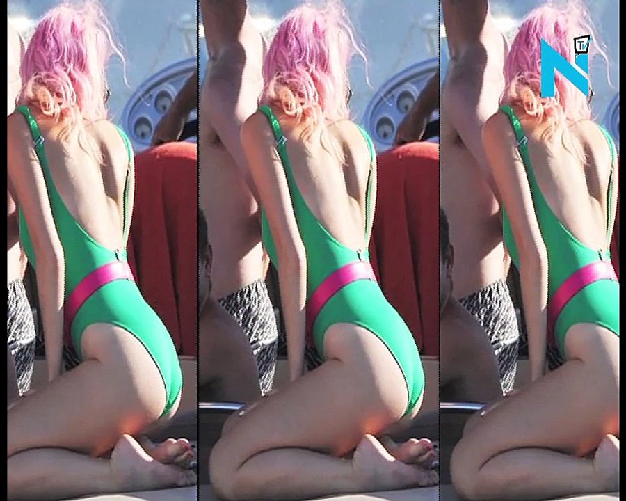 Not a Lot(t) on! Pixie leaves little to the imagination in an eye-wateringly high cut swimsuit... as she joins shirtless beau Oliver Cheshire in Ibiza