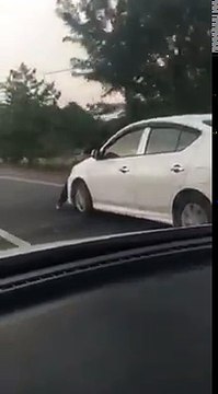 Husband Clings To Car Bonnet As Wife Drives Off!